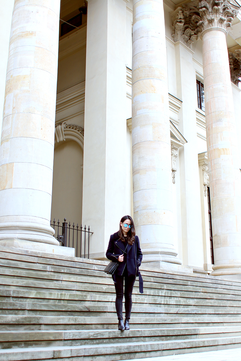 Nisi is wearing: Céline Trio Bag, Acne Jensen Boots, Biker Jacket, Mirrored Sunglasses