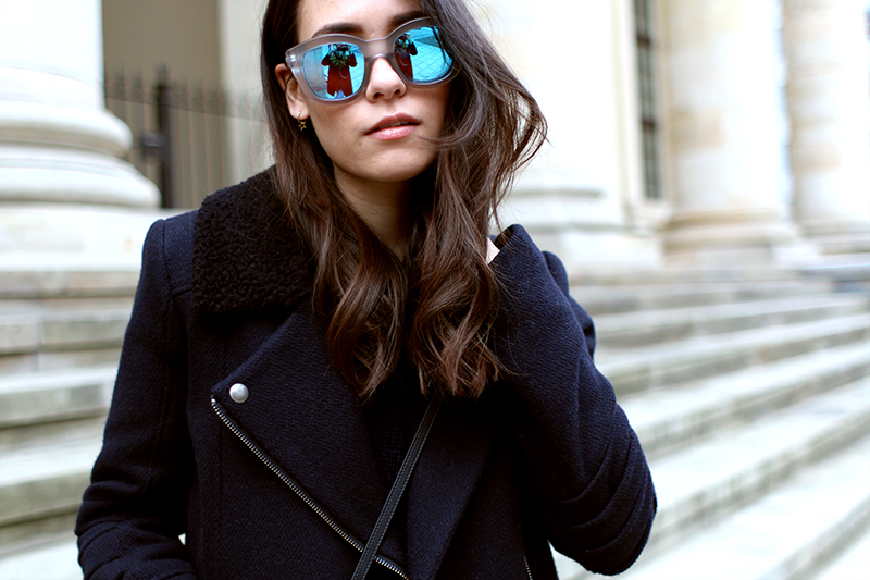 Nisi is wearing: Céline Trio Bag, Acne Jensen Boots, Biker Jacket, Mirrored Sunglasses