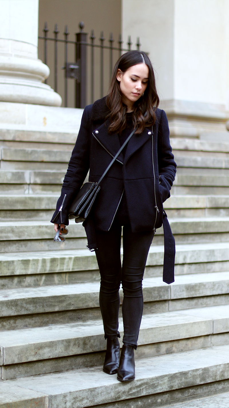 Nisi is wearing: Céline Trio Bag, Acne Jensen Boots, Biker Jacket, Mirrored Sunglasses