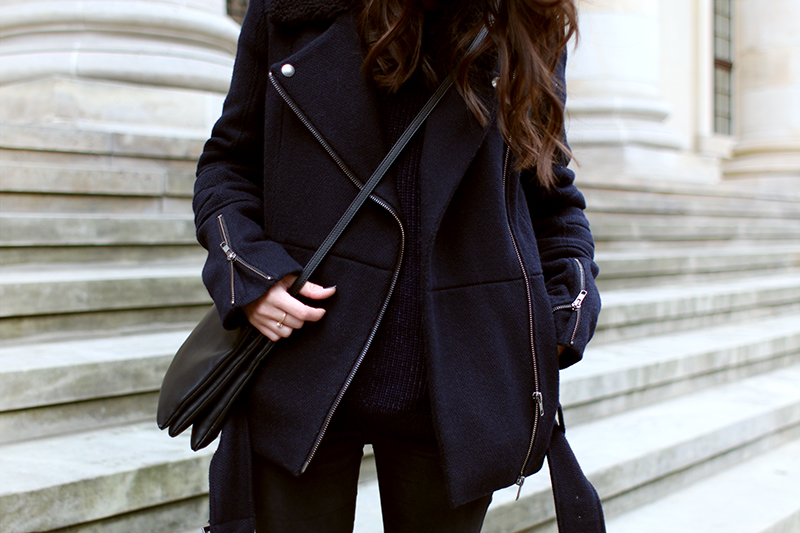 Nisi is wearing: Céline Trio Bag, Acne Jensen Boots, Biker Jacket, Mirrored Sunglasses