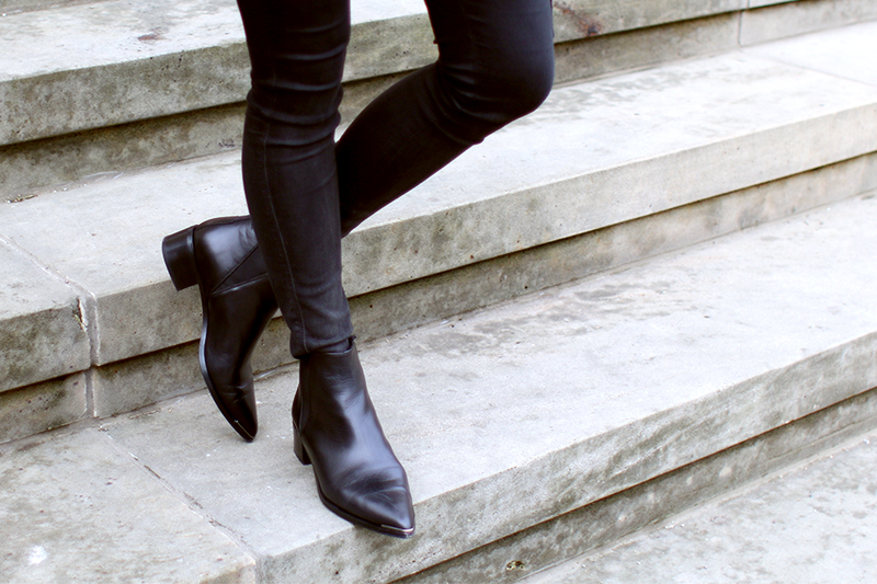 Nisi is wearing: Céline Trio Bag, Acne Jensen Boots, Biker Jacket, Mirrored Sunglasses