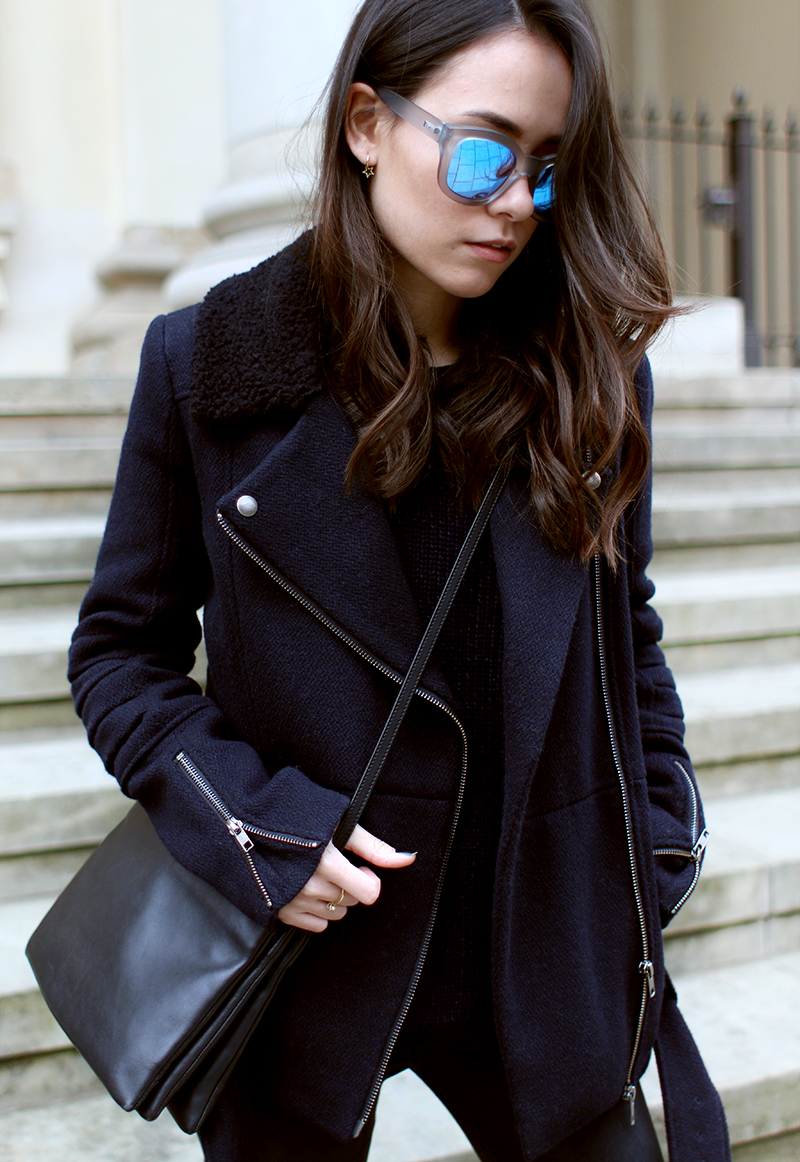 Nisi is wearing: Céline Trio Bag, Acne Jensen Boots, Biker Jacket, Mirrored Sunglasses
