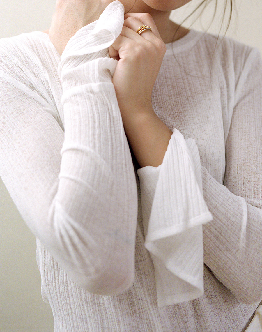 Outfit: All White. Nisi is wearing: White longsleeve. White trousers, Jil Sander, Earrings