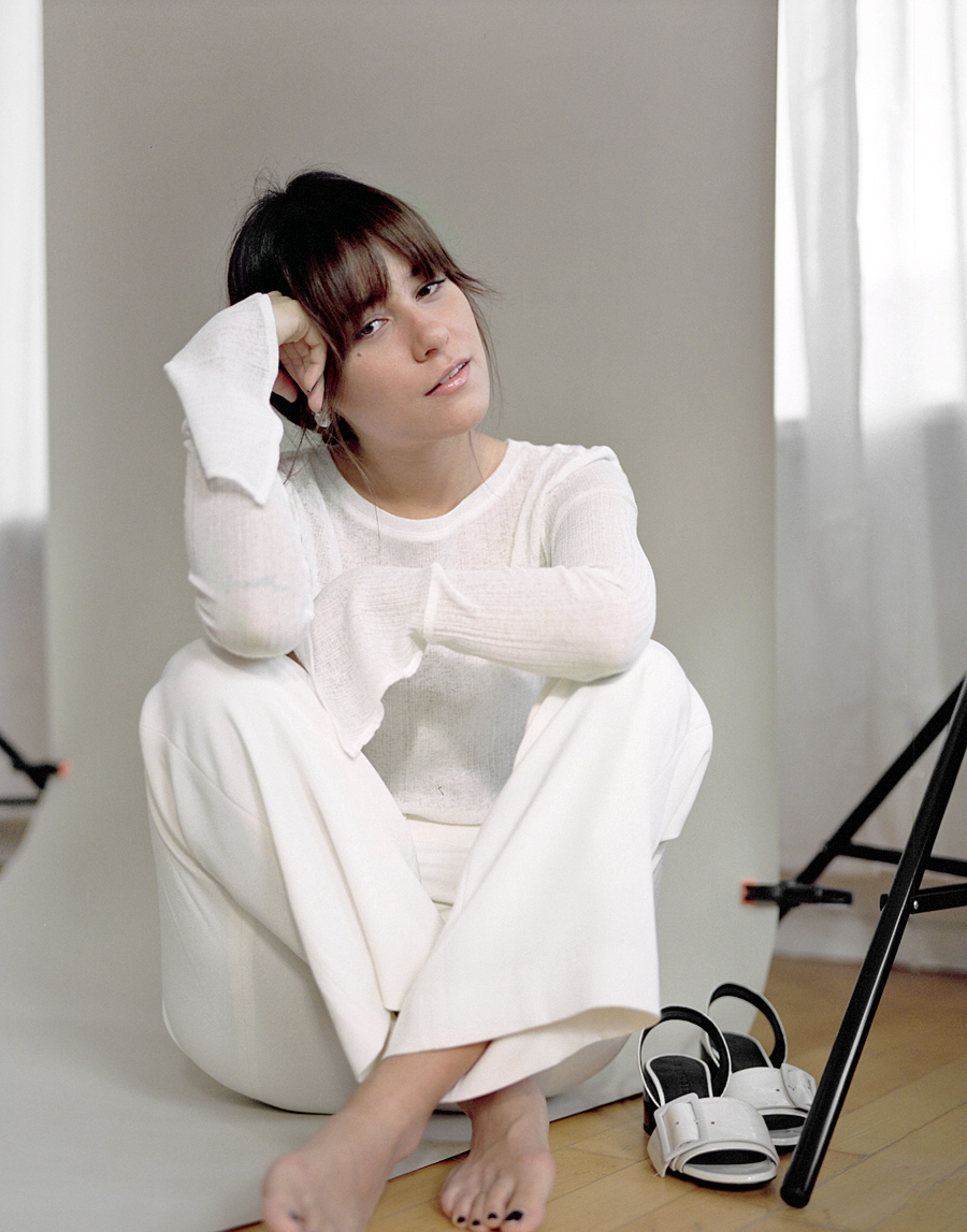 Outfit: All White. Nisi is wearing: White longsleeve. White trousers, Jil Sander, Earrings