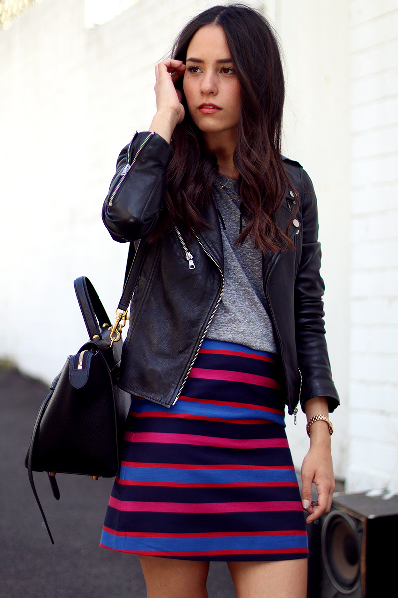 Nisi is wearing: Marc's Striped Skirt, Zara Leather Jacket, Le Specs Mirrored Sunglasses, Topshop Espadrilles and Céline Belt Bag Mini