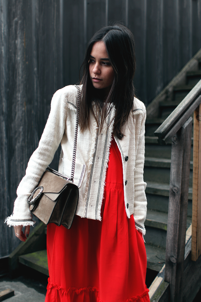 At the flower market. Nisi is wearing: Isabel Marant Jacket, Gucci Dionysus bag, red dress, mules