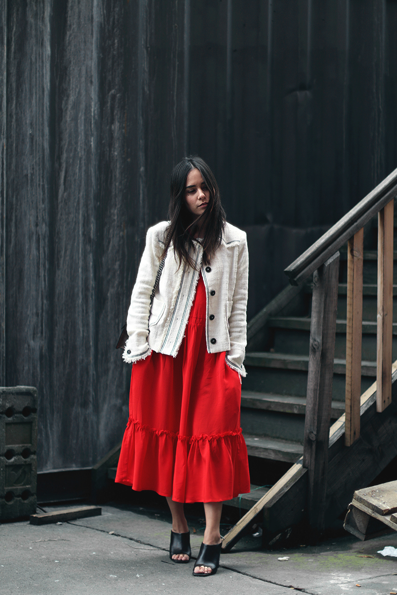 At the flower market. Nisi is wearing: Isabel Marant Jacket, Gucci Dionysus bag, red dress, mules
