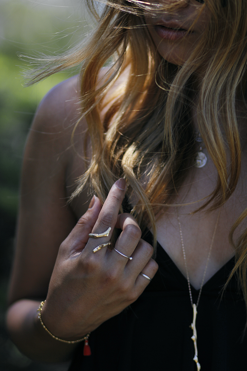 Gold ring and necklace by NINA KASTENS, from the THORNS collection.