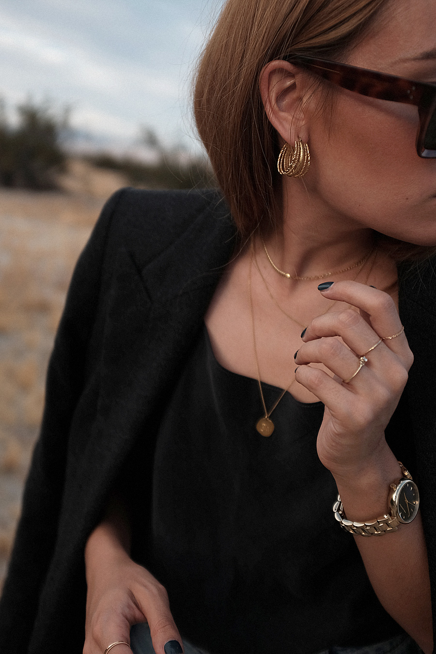 Outfit: Caping up that Blazer. Desi is wearing: Silk top, Blazer, Denim Mom jeans, Sandals, Céline Sunglasses, Brie Leon Earrings, Missoma Shark tooth necklace