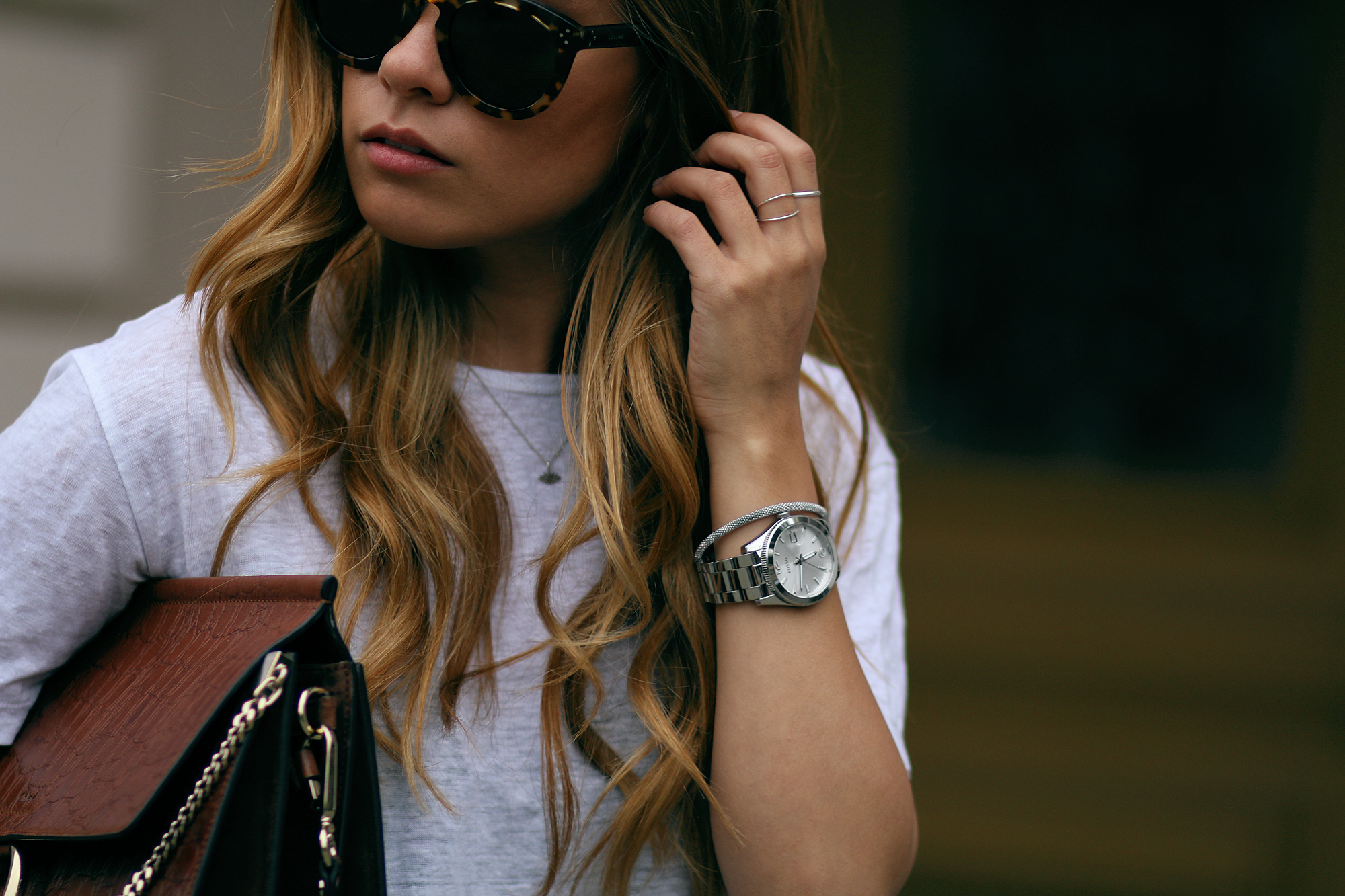 Desi wearing: Isabel Marant Étoile Printed trousers, Hermès Oran sandals, Chloé Faye bag, Céline Sunglasses, white linen shirt, boyfriend watch