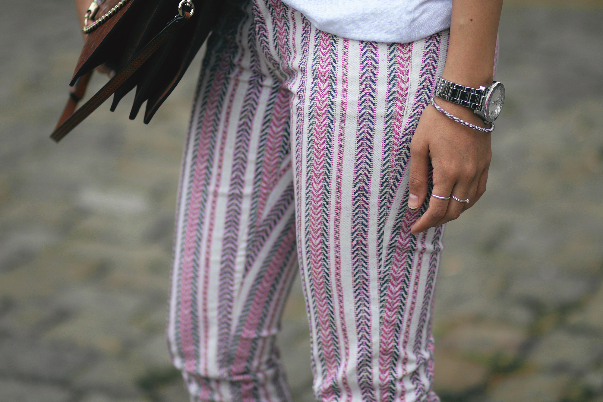 Desi wearing: Isabel Marant Étoile Printed trousers, Hermès Oran sandals, Chloé Faye bag, Céline Sunglasses, white linen shirt, boyfriend watch