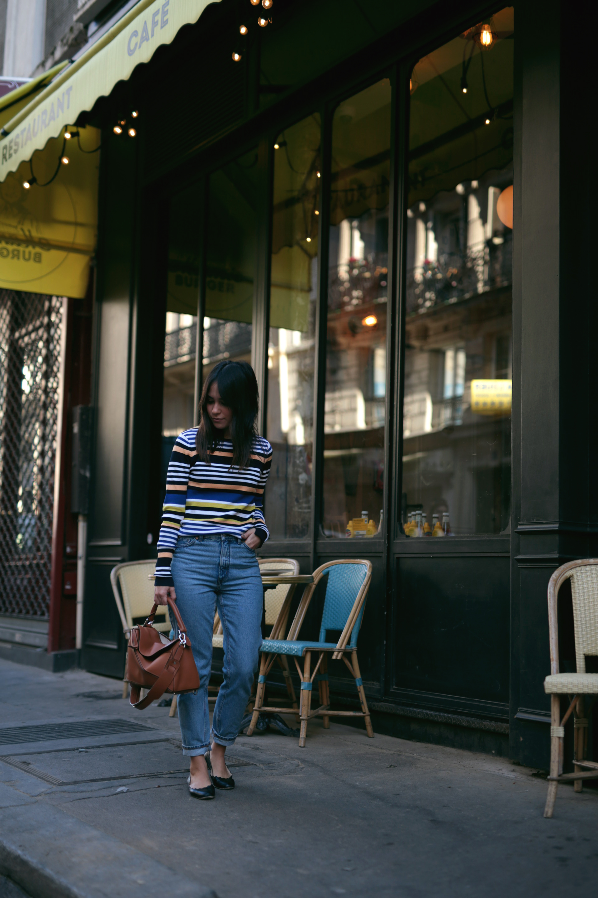 Nisi wearing Loewe Puzzle Bag, Chloé Lauren Flats, Monki Mom Jeans and Zara Striped Longsleeve