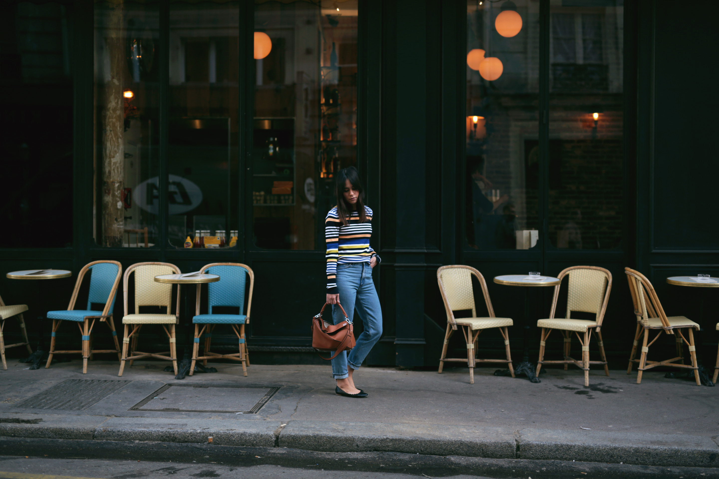 Nisi wearing Loewe Puzzle Bag, Chloé Lauren Flats, Monki Mom Jeans and Zara Striped Longsleeve