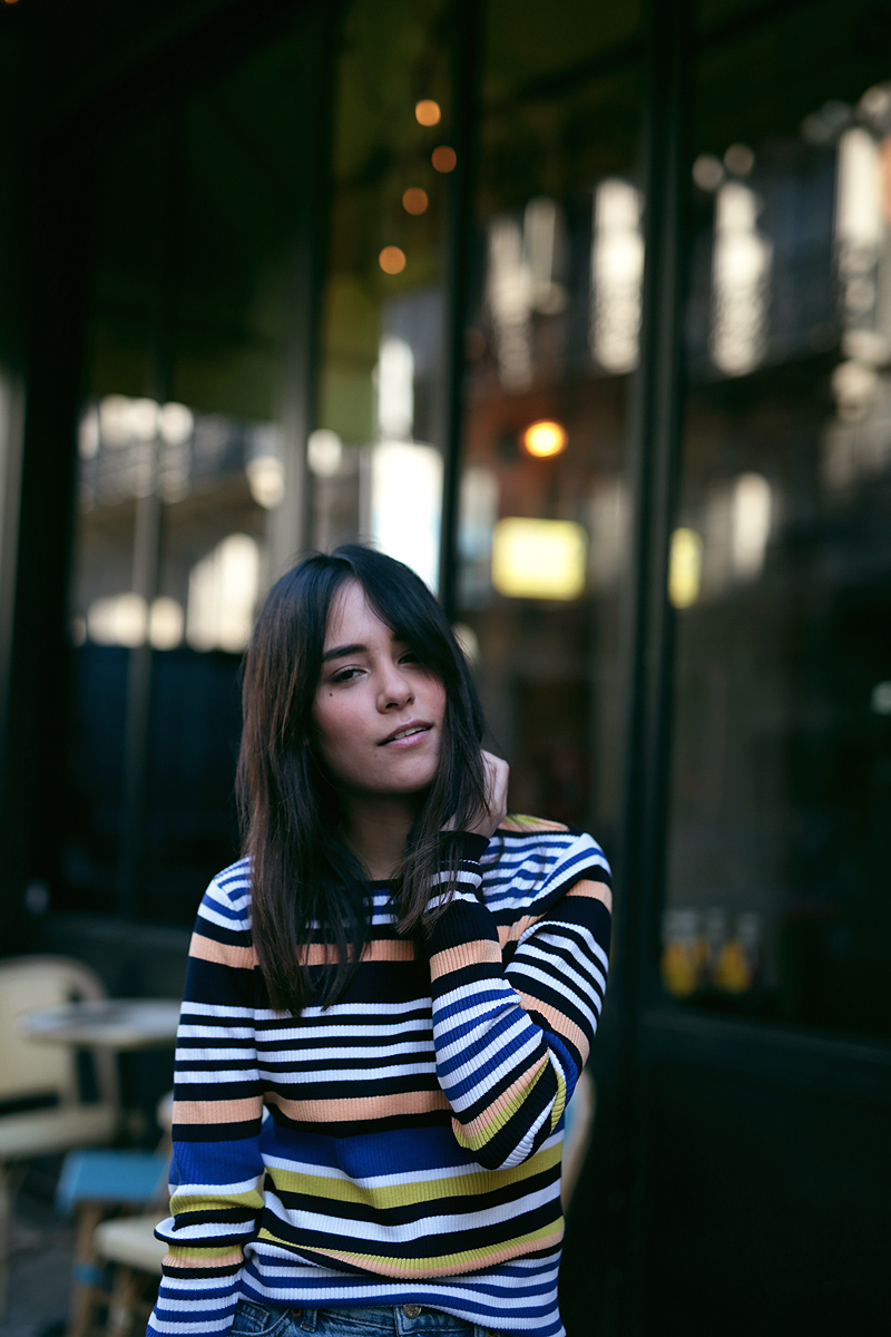 Nisi wearing Loewe Puzzle Bag, Chloé Lauren Flats, Monki Mom Jeans and Zara Striped Longsleeve