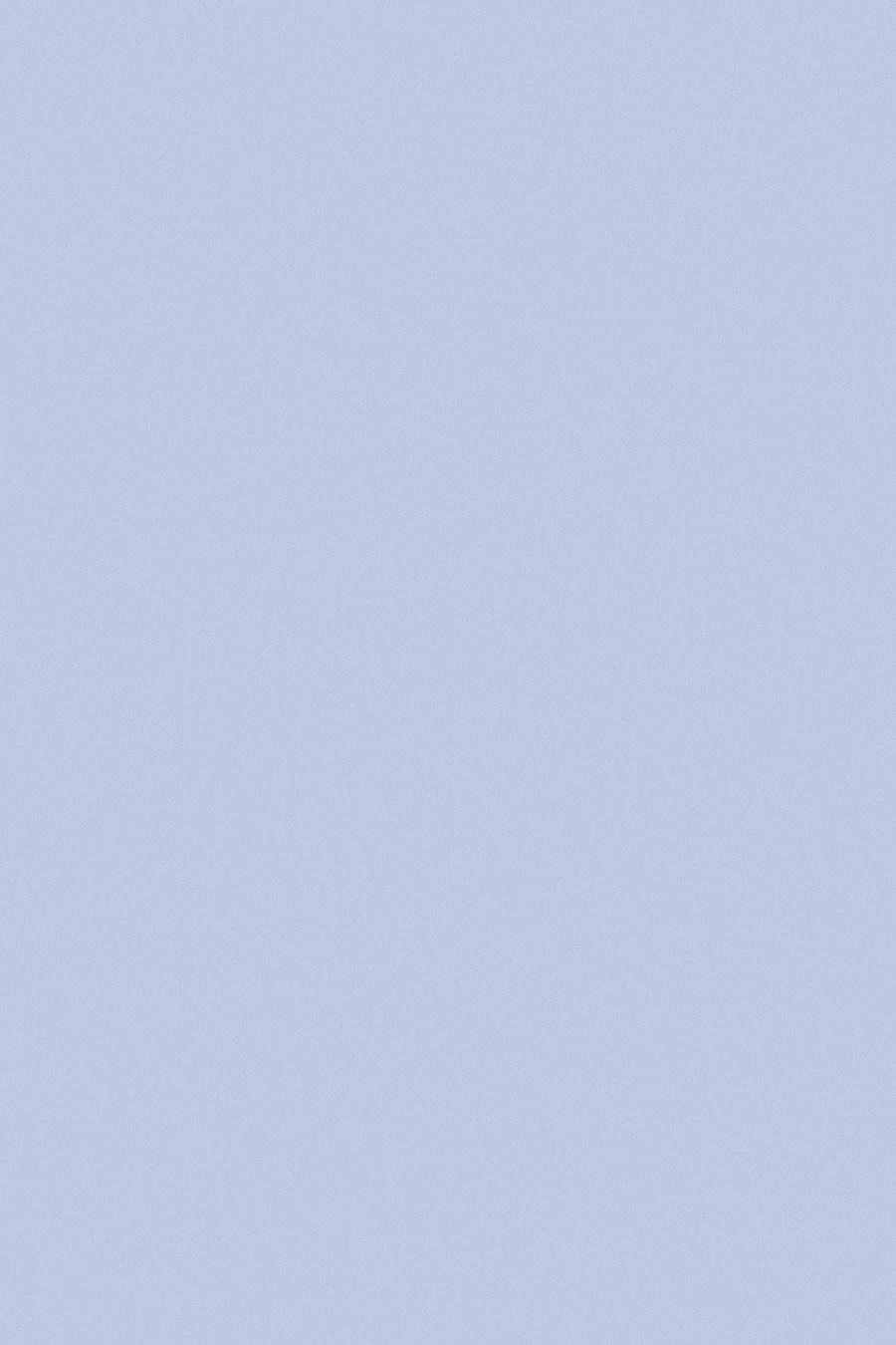 Nisi is wearing: The Row Ascot bag,  Céline Alphabet necklace, Striped dress, Black strappy sandals, Coral necklace, Gold pearl earring