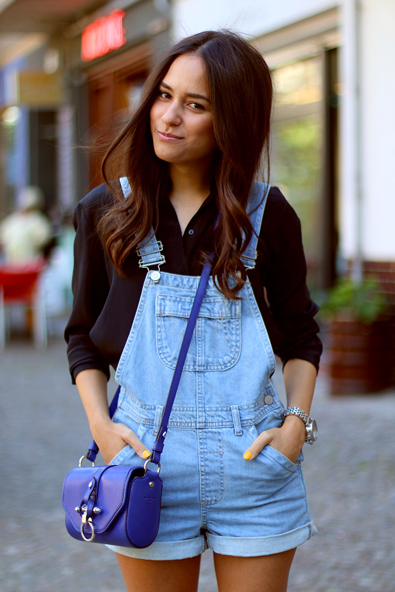 Nisi is wearing: Topshop Dungarees or denim overall, black silk shirt from Zara, Givencha Obsedia small in blue and Birkenstocks